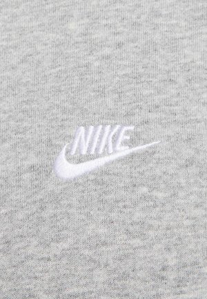 Light gray crewneck sweatshirt made from soft fabric. Features an embroidered white Nike logo in the center.