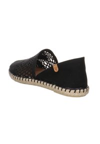 Black woven slip-on shoe with a large cutout design, natural jute sole, and textured upper. Features a small logo accent.
