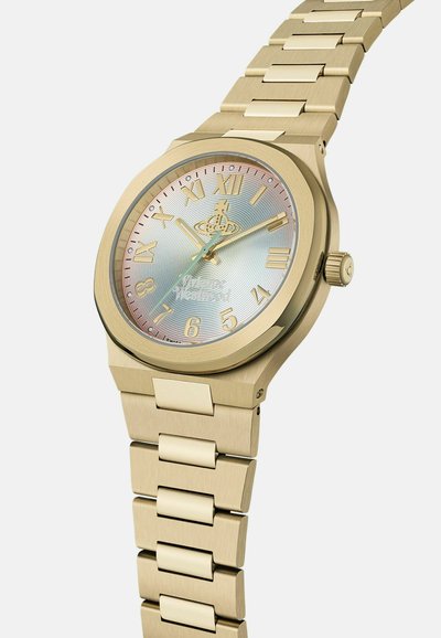 Gouden metalen horloge met een ronde wijzerplaat, Romeinse cijfer markers en een gradient iriserende dial. Beschikt over een gestructureerde schakelarmband.