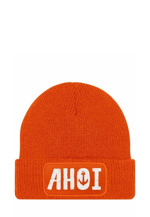 Orange knit beanie with a folded cuff. Features a white rectangular patch with the text "AHOI" and an anchor graphic. Textured appearance.