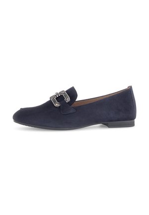 Navy blue suede flat shoe with a decorative buckle detail on the front. Low heel and smooth texture, designed for comfort and style.