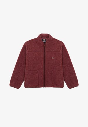 Bordo flašica jakna s visokim ovratnikom, prednjim patentnim zatvaračem i dva velika džepa. Ima teksturiranu, mekanu tkaninu.