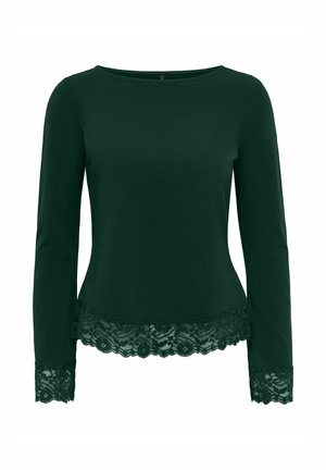 Chemise manches longues vert foncé avec bordure en dentelle à l'ourlet et aux poignets, avec un col rond et une silhouette ajustée.
