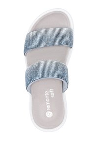 Blue slide sandal with two sparkling rhinestone-embellished straps, soft gray insole, and white rubber outsole. Brand logo visible.