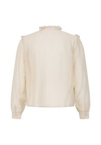Blouse à manches longues couleur crème avec une texture subtile, col à volants et poignets boutonnés, vue de dos sur fond blanc.