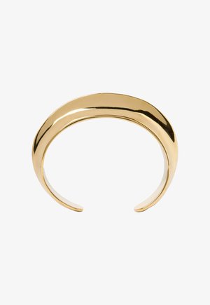 Bracelet manchette en or lisse et brillant, avec un design épais et arrondi, de forme ouverte pour être porté au poignet.