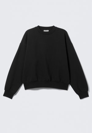 Black crewneck sweatshirt with long sleeves and ribbed cuffs and hem, laid flat against a light background.
