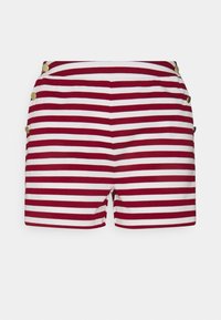 Červeno-bílé pruhované šortky s akcenty zlatých knoflíků na bocích, vyrobené z měkké látky. Krátký střih s těsným fit.