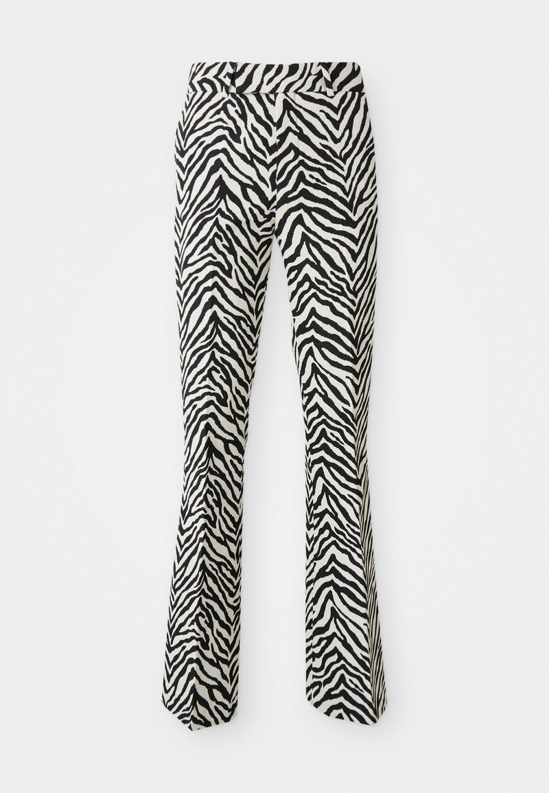 Pantalons évasés à motifs zébrés noir et blanc. Fabriqués en tissu doux avec une taille haute et une évasement élégant en bas.