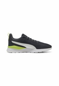Chaussures de sport pour hommes en maille gris foncé avec une bande blanche et des accents vert lime. Présente une semelle texturée et un col rembourré pour le confort.
