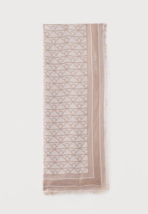 Sciarpa rettangolare beige e bianca con motivo a anelli geometrici e bordo, con il marchio "Calvin Klein" su un lato.