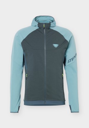 Μπουφάν με κουκούλα διχρωμίας μπλε, με φερμουάρ μπροστά, τσέπες με φερμουάρ, λογότυπο στο στήθος και κείμενο "DYNA" στο αριστερό μανίκι.
