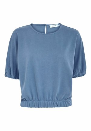 Sinine lühikeste varrukatega ülemine osa, ümar kaelus, elastne vöökoht ja puhvite varrukad. Valmistatud pehmest kangast, millel on sile tekstuur. Tagumine sulgemise detail.