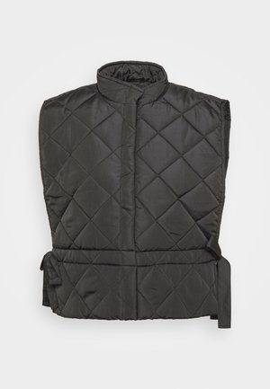 Chaleco acolchado negro con cuello alto, con patrones de diamantes, lazos laterales y una textura ligera y suave.