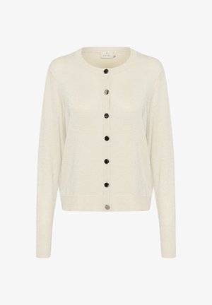 Světle krémový kardigan vyrobený z měkké, lesklé pleteniny. Má dlouhé rukávy, kulatý výstřih a černé knoflíky na přední straně.