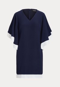 Laivansinis mekko, jossa on lyhyet, virtaavat hihat valkoisella reunuksella, V-pääntie ja takaosa vetoketjulla. Valmistettu pehmeästä, sileästä kankaasta.