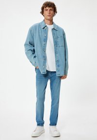 Koton MICHAEL - Vaqueros slim fit - blue denim