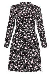 Svart klänning med långa ärmar, prydd med rosa hjärtan och vita prickar. Slät tyg, figursydd midja och utställd kjoldesign.