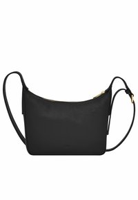 Sac en cuir noir porté travers, avec un dessus zippé, une silhouette fine et une longue sangle réglable. Présente un design minimaliste et des accessoires en or.