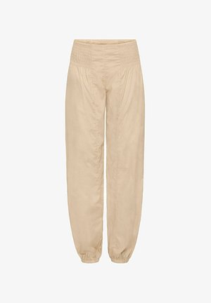 Beige, lette bukser med samlet elastisk midjebånd, smale mansjetter og en jevn tekstur. Har et avslappet, løst passformdesign.