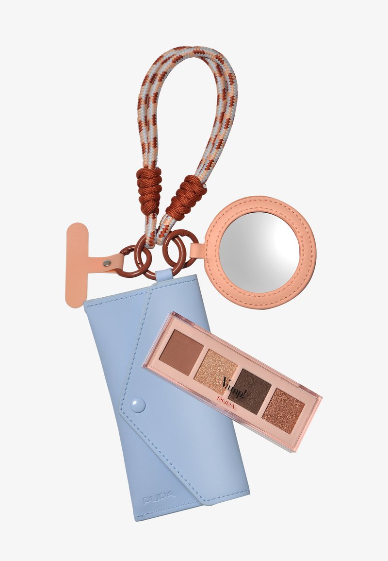 Blauwe leren etui met knoopsluiting, compact spiegel in roségoud en een oogschaduwpalette met vier tinten: matte bruin, glinsterend brons.