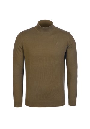 Ruskea pitkähihaista poolopaitaa muistuttava neule, jossa on vasemmassa rinnassa hienovaraisesti kirjailtu logo, esillä neutraalilla taustalla.