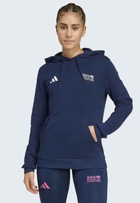 Navy hoodie with a front pocket, drawstring hood, and white logo. Features ribbed cuffs and hem, made from soft material for comfort.