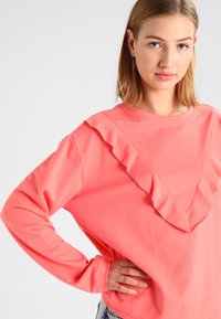 Urban Classics LADIES TERRY VOLANT CREW - Melegítőfelső - coral