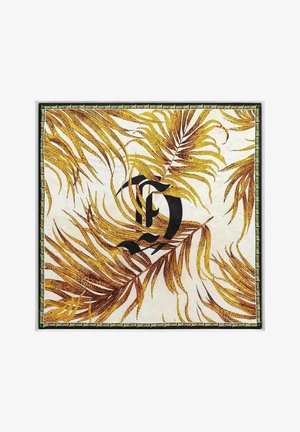 Foulard quadrato con motivo di foglie tropicali gialle e marroni, lettere stilizzate nere al centro e bordo testo "just cavalli" su sfondo bianco.