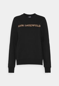 Sudadera negra en mezcla de algodón, con "KARL LAGERFELD" en letras brillantes de color rosa dorado en el pecho; cuello redondo y puños de canalé.