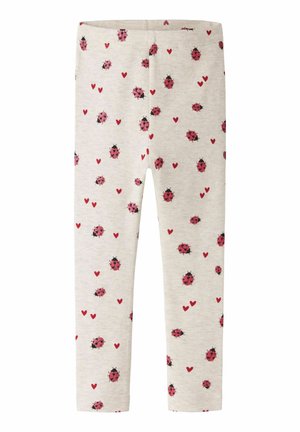 Børns beige leggings med spredte lyserøde mariehøns og røde hjerteprint, med elastisk talje og ben i fuld længde.
