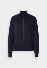 Marineblå genser med høy krage i myk strikk, med halvlukking foran, lange ermer og tettsittende nederkant. Minimalistisk design uten mønstre.