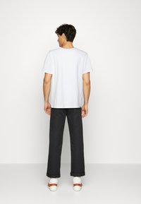 Puma DOWNTOWN TEE - T-shirt basic - puma white
