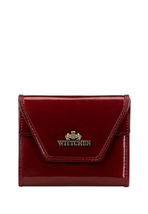 Red patent leather wallet with a gold logo, featuring a flap closure and clean lines. The finish is glossy and smooth, showcasing its sleek design.