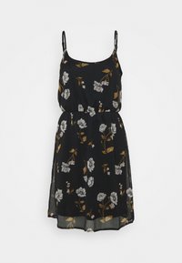 Czarna sukienka w kwiaty z regulowanymi ramiączkami typu spaghetti, marszczonym pasem oraz kwiatowym wzorem w bieli i złocie na przezroczystym materiale.