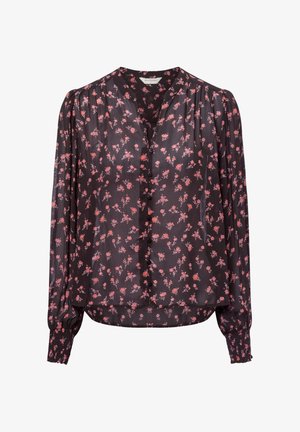Zwarte blouse met bloemenpatroon en lange mouwen, voorzien van een V-hals, knoopsluiting en geplooide manchetten. Kleine roze bloemen verspreid over de stof.