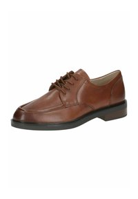 Chaussure en cuir marron à lacets avec un bout rond, des coutures subtiles, une semelle en caoutchouc noir et un petit talon empilé.
