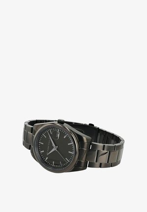 Black metal wristwatch with a round face, silver hour markers, three hands, a date window, and linked bracelet band.