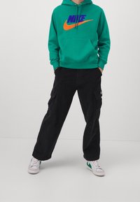 Nike Sportswear Mikina s kapucí - green