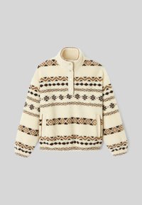 Pull en polaire crème avec des motifs géométriques marron et noir. Il possède un col montant, une patte de boutonnage et des poches latérales. Texture douce.