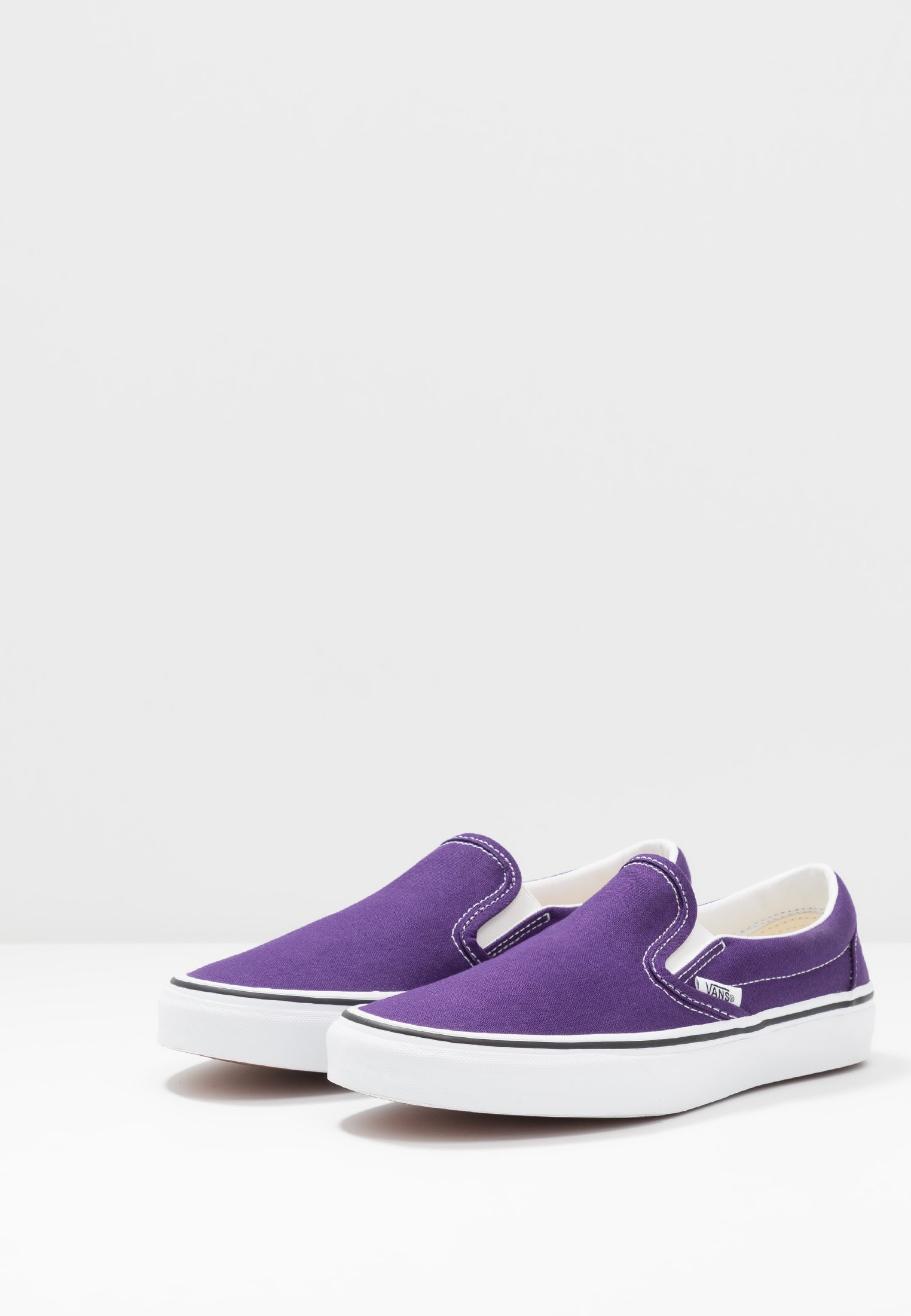 vans slip on violet