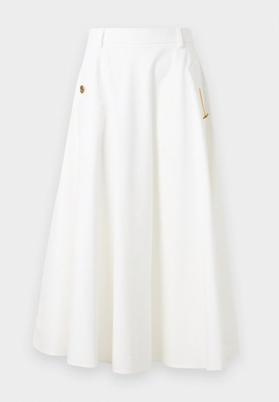 White A-line midi skirt with side pockets, gold chain and decorative button details, and belt loops at the waistband.