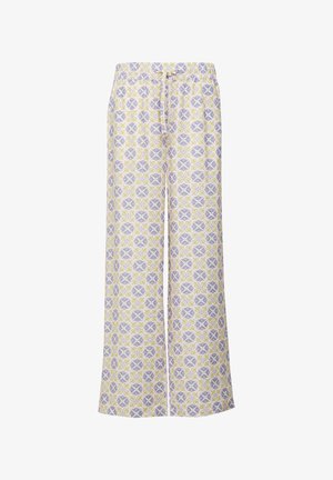 Light-colored, patterned wide-leg pants feature floral designs in yellow and purple, with an elastic waistband and drawstring detail.