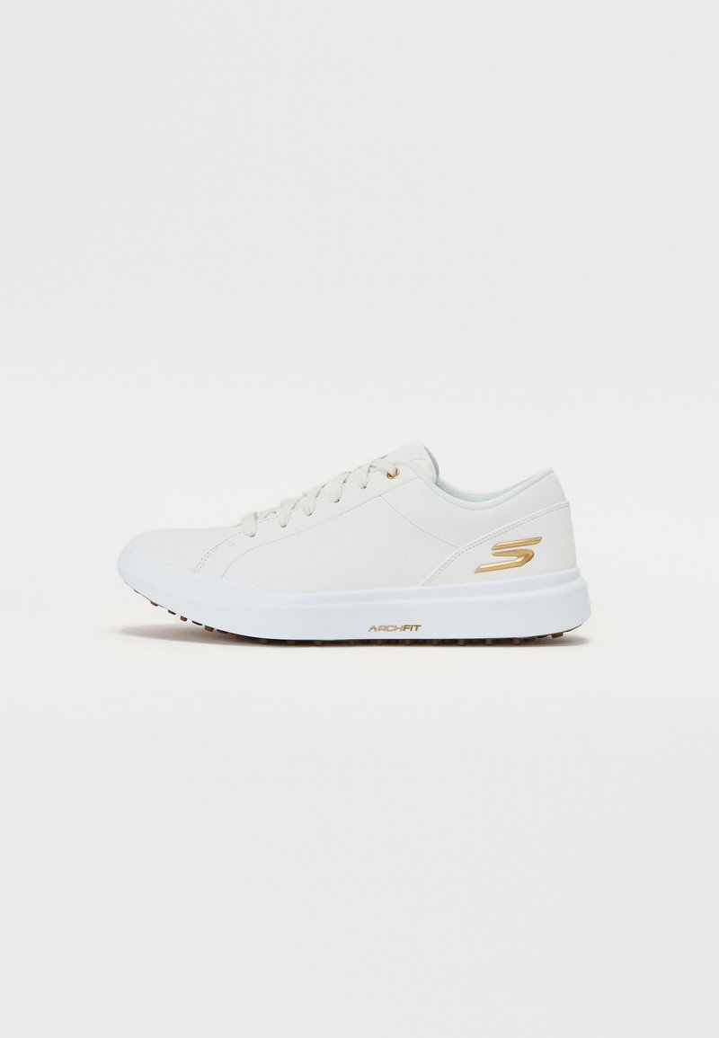 White sneaker with smooth synthetic upper, gold accents, and sturdy rubber sole. Features round toe, lace-up design, and cushioned interior.