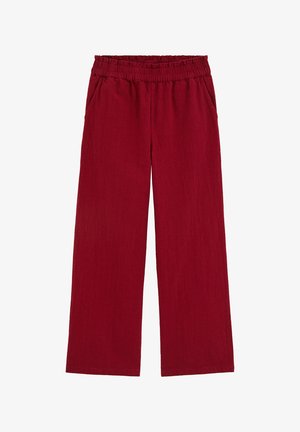 Piros bőszárú nadrág elasztikus derékrésszel és oldalzsebekkel, puha, texturált anyagból készült.