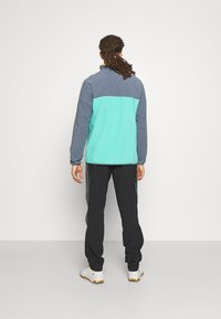 Norrøna TRAINING PANTS - Calças para exterior - caviar/dark grey melange