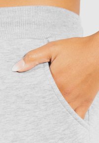 Smilodox CASSANDRA - Trainingsbroek - grau melange