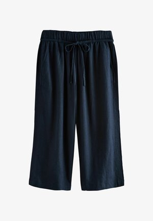 Granatowe, lniane spodnie cropped z elastycznym pasem, sznurkiem do regulacji i kieszeniami po bokach. Gładka faktura, luźny krój.