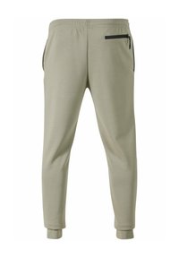 Pantalons de jogging gris clair avec une taille élastique, des poches latérales et des poignets fuselés ; comprend une poche zippée sur le côté droit.