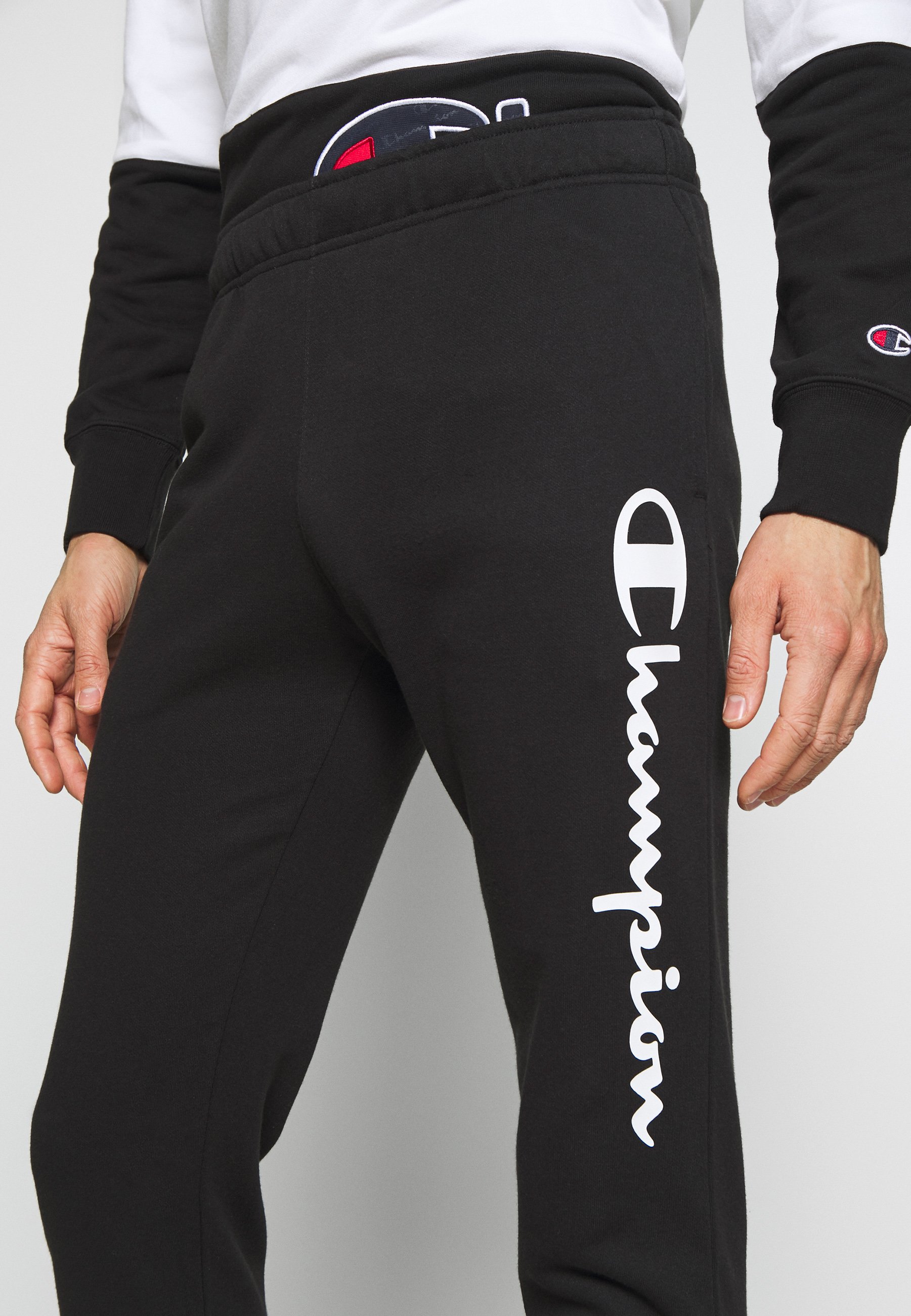 Champion CUFF PANTS Joggebukse black Zalando.no Champion LOGO RIB CUFF Joggebukse black Zalando.no